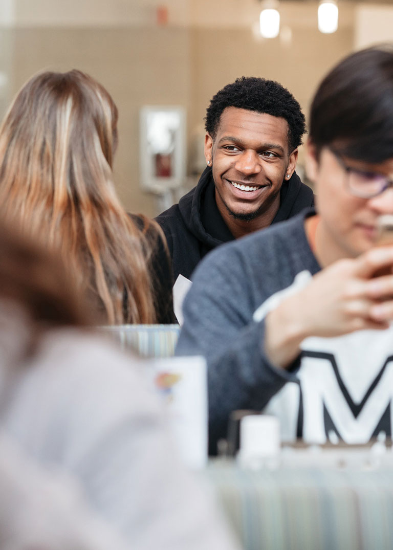 Students socializing in campus cafeteria